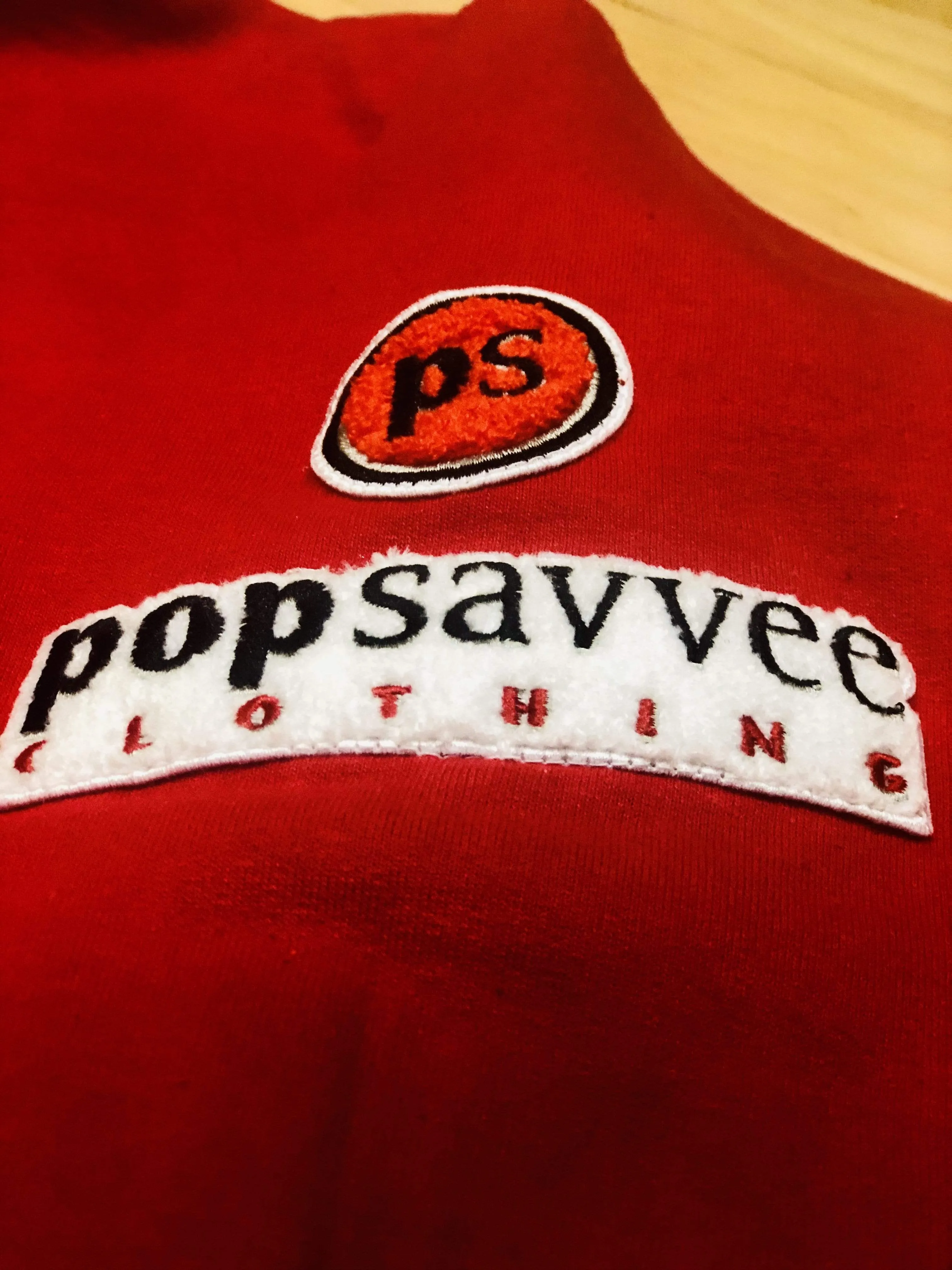 Red Pullover Style Hoodie w/ Chenille Embroidered “Popular Not Famous” Logo