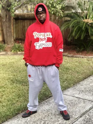 Red Pullover Style Hoodie w/ Chenille Embroidered “Popular Not Famous” Logo